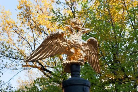 Monument of a bicephalous eagle in the park Stock Photos