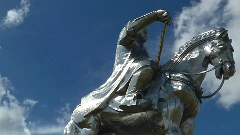 The monument to Chinggis Khan in Mongolia on the background of floating clouds. Stock Footage 120297872