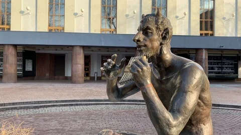 Monument "Damn plays the flute" Stock Footage 103580011