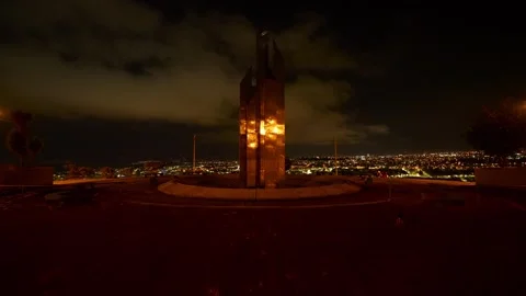 Monument to the First Printing Press illuminating Ambato at night Stock Footage 310007863