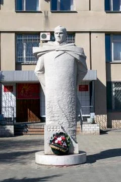Monument with flowers Stock Photos