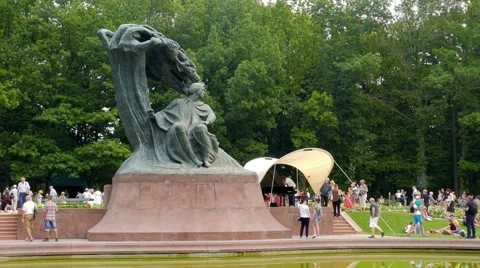 Monument of Frederic Chopin in Lazienki Park. Largest park in Warsaw, Poland Stock Footage