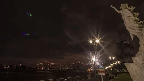 'Monument to the Immigrant' Statue &amp; Greater New Orleans Bridge Night Timelapse Stock Footage 78519132