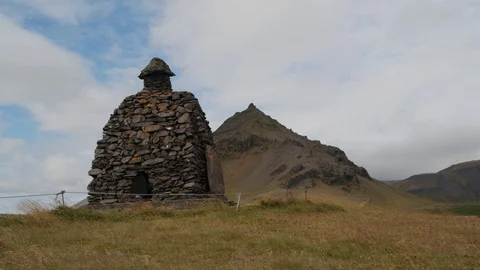 A monument made of stones in Hellnar, West Iceland Stock Footage 118947769