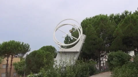 Monument metal orbit motion round science museum outdoors Barcelona Stock Footage 327207109