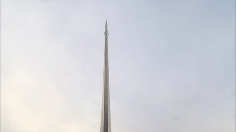 Monument of a rocket against background of clouds timelapse Stock Footage 82046570
