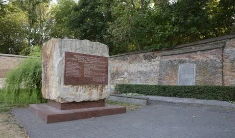 The monument is a stone at the site of the execution of prisoners of the Lubl Stock Photos