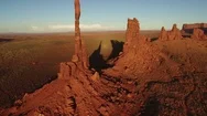 Monument Valley Aerial Shot Of Totem Pole At Sunset - Fly In Stock Footage
