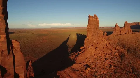 Monument Valley Aerial Shot of Totem Pole at Sunset - Fly Over Stock Footage