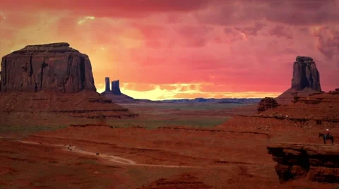 Monument Valley with Background Red Clouds in Timelapse 스톡 동영상 58281155