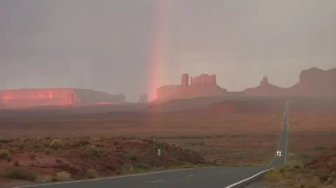 Monument Valley highway with rainbow Stock Footage 21662960