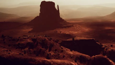 Monument Valley with large rock formation at sunset in Utah Stock Footage 344854229