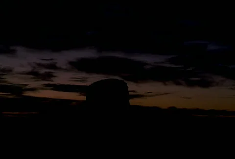 Monument Valley Mesa Sunrise Clouds NTSC Stock Footage 537952