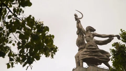 Monument Worker and Kolkhoz Woman among the branches of trees Stock Footage