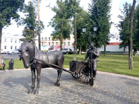 A monument to the worker of the Soviet period Stock Photos