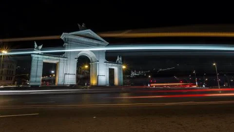 Monumental gate at night Stock Photos