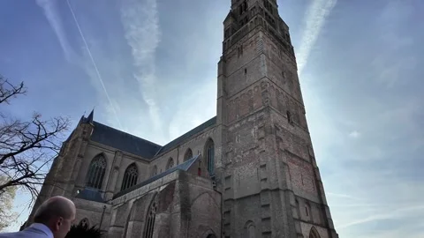 Monumental stone and brick facade with Gothic arches in Bruges. Vídeos de archivo 333196960