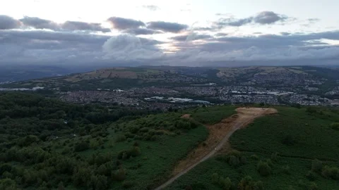 Moody Aerial Drone Flight Over Caerphilly Mountain on Gloomy Day, Wales Stock Footage 343577890
