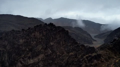 Moody Aerial Of Eroded Rock Layers And Valleys, Noyon Uul, Mongolia Stock Footage 333552974
