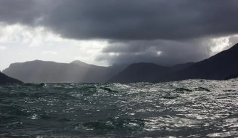 Moody and atmospheric rough seas off the coast of Hout Bay, South Africa Stock Photos