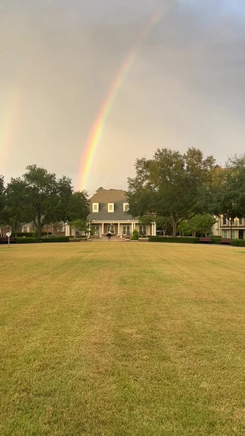 Moody atmosphere with rainbow over a beautiful house in nature after rain. Stock Footage 337264202