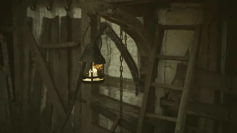 Moody attic with warm light highlighting aged wood and cobwebs Stock Footage 335595889