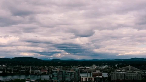 Moody Clouds and sun breaks roll across the city of Portland Oregon, Timelapse Stock Footage 93489899