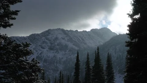 Moody Clouds Over Mountain Between Trees 스톡 동영상 229624168