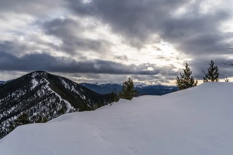 Moody clouds over mountain peak Stock Footage 128673107