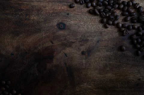 Moody Coffee Beans Flat Lay Background on Dark Chopping Board with Copy Spac Фото