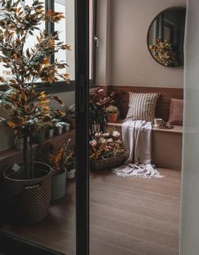 Moody covered balcony Interior fall themed and cosy feeling with wooden floor Stock Photos