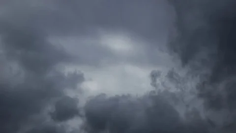 Moody Dark Clouds turning to Sheets of Rain Timelapse Stock Footage 73309920