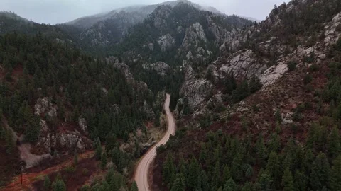 Moody day in the mountains with low clouds Stock Footage 274527023