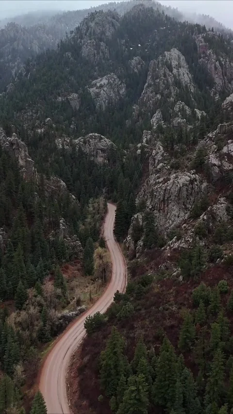 Moody day in the mountains with low clouds Stock Footage 274541585