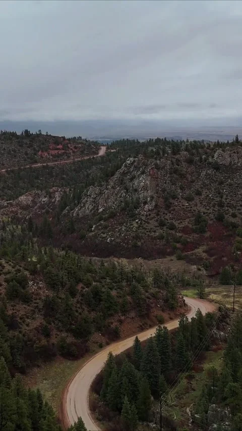 Moody day in the mountains with low clouds Stock Footage 274541794