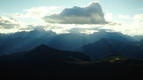 Moody Drone with Light Rays over Mountain Layers at Passo Giau, Dolomites Video stock 316669306