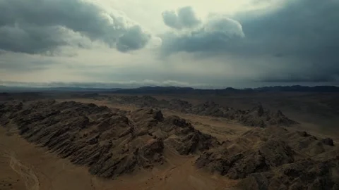 Moody Drone Shot Of Folded Strata In Arid Terrain, Noyon Uul, Mongolia Stock Footage 333554040