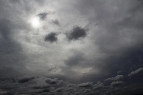 Moody grey clouds Stock Photos