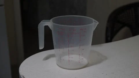 Moody kitchen measuring cup 库存影片 336389754
