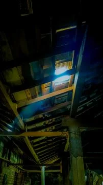 Moody Light Streaming Through Rustic Wooden Ceiling Stock Photos