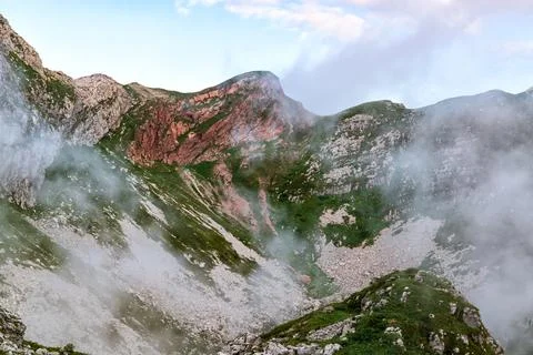 Moody mountains in the clouds Stock-Fotos