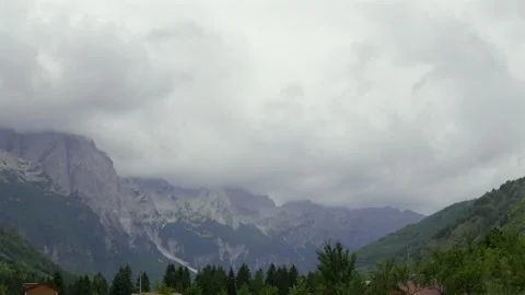 Moody Overcast Sky Rolling Over Valbona Valley Mountains in Albania Stock Footage 338441960