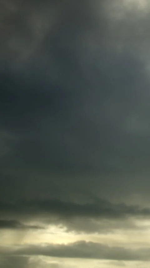 Moody skies: dark and brooding clouds captured in timelapse video. Vertical. 스톡 동영상 239007656