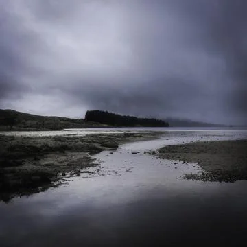 Moody sky over Loch Tulla in Scottish Highlands Stock Photos