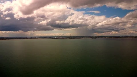 Moody Sky Poolbeg Smokestacks, View from Dun Laoghaire July 2025 Stock Footage 316701200