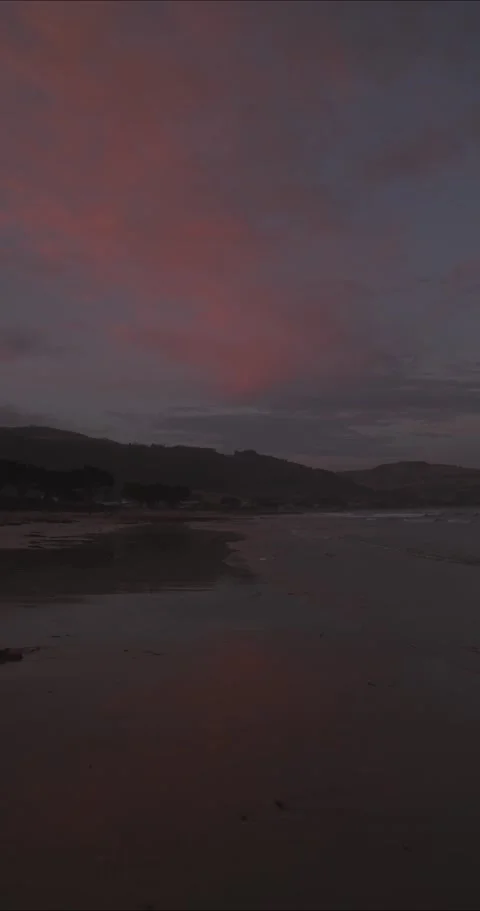 Moody sunset over beach Stock Footage 171191702