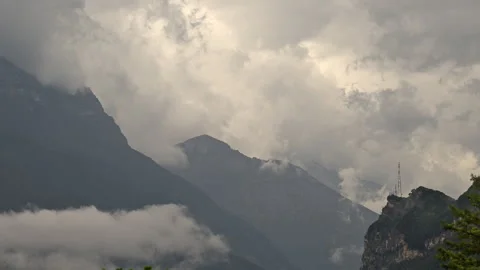 Moody time lapse of turbulent clouds rising with bad weather ahead Stock Footage 256649099