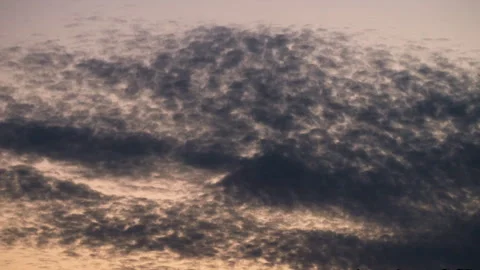 Moody Timelapse of Patterned Altocumulus Clouds During Sunset Stock Footage 317819838