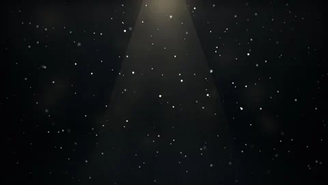 Moody Winter Night Snowfall with Dramatic Soft Cone Light and Glowing Particles Stock Footage 341226497