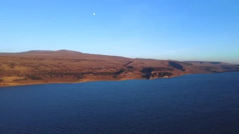 Moon Above The Evening Lake Stock Footage 168969739
